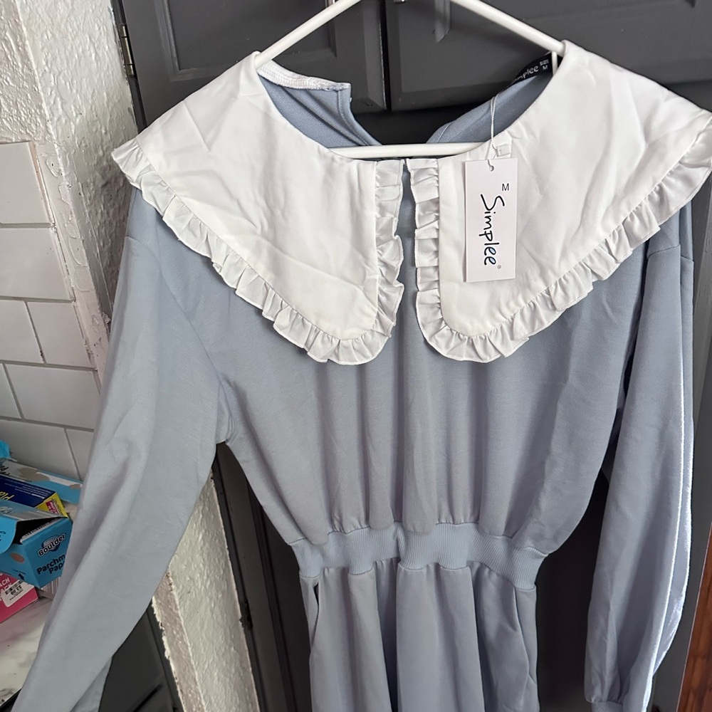 Women’s blue dress with Peter Pan collar